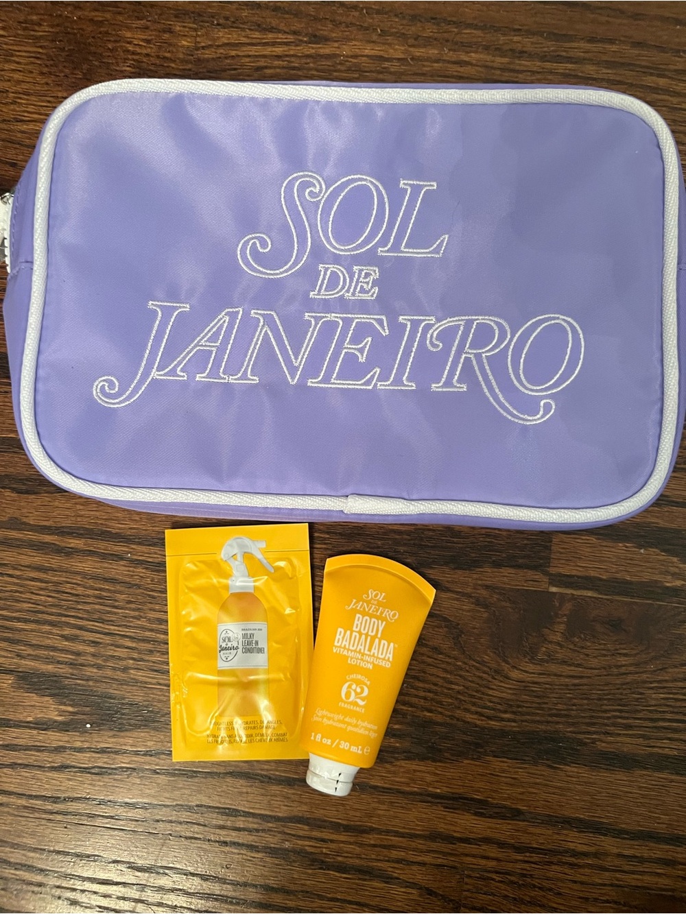 NWT Cute Sol de Janeiro Bag + travel lotion